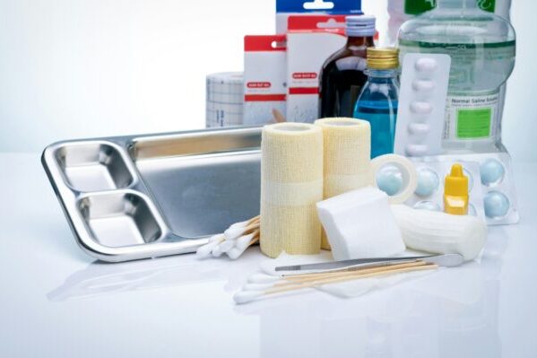 Wound care dressing set. Wound care equipment in hospital for nurse. Conform bandage, forceps